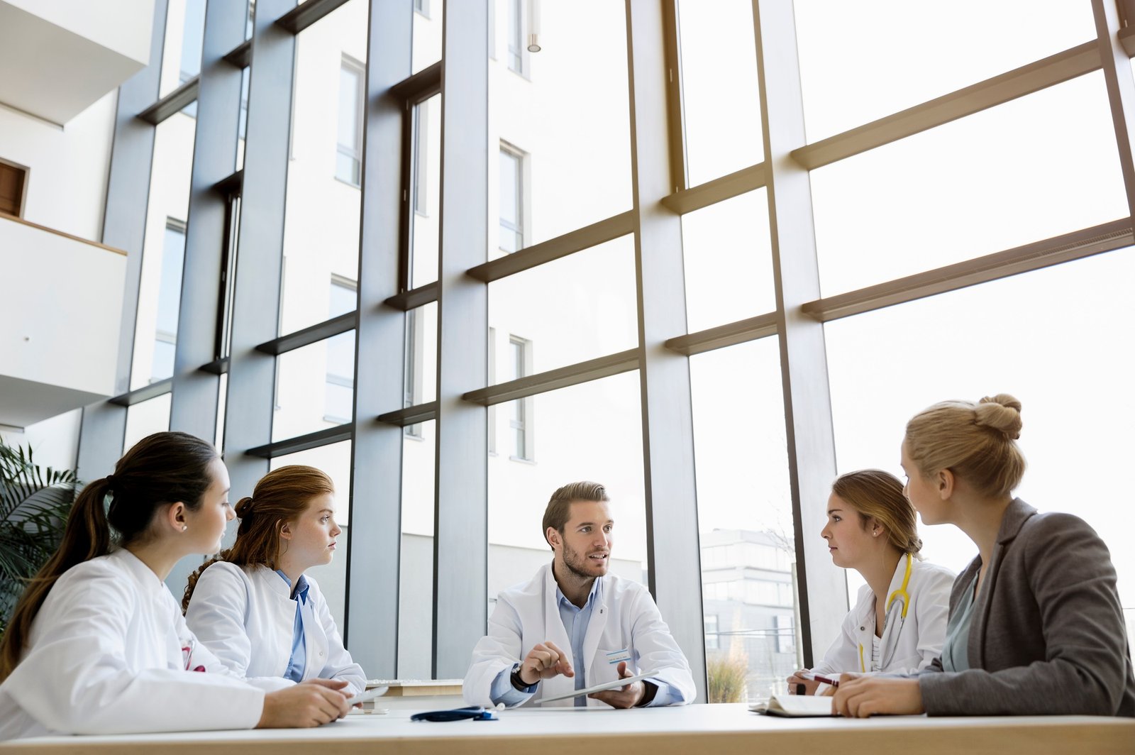 Group of doctors in meeting with consultant